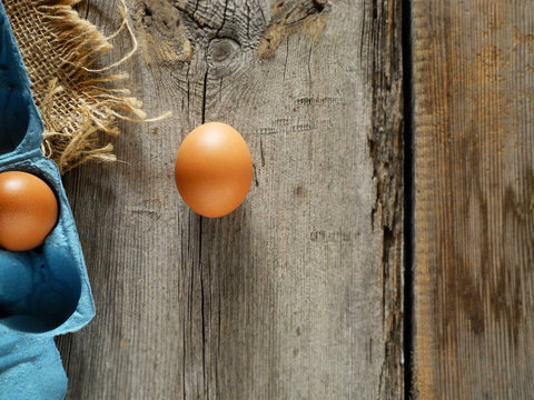 eggs on wooden table, world egg day - Powered by Adobe