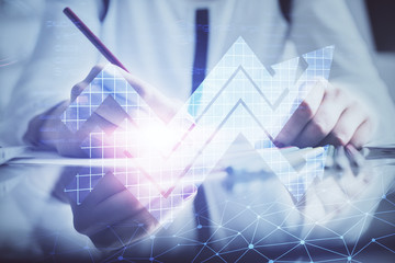 Blue arrow over woman's hands taking notes background. Concept of success. Double exposure