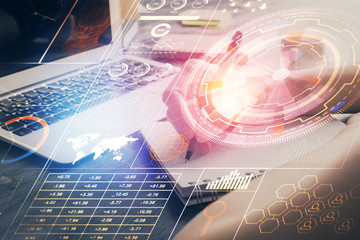 Multi exposure of writing hands on background with data solution hologram. Technology concept.
