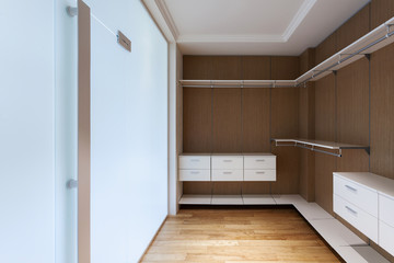 Modern wardrobe with contemporary interior design in bedroom