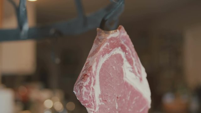 meat hanging from meat hook