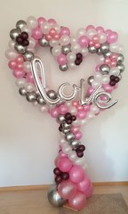 pearl necklace on pink background