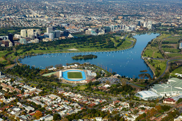 Obraz premium Aerial view of Albert Park Lake and the Lakeside stadium in South Melbourne Australia