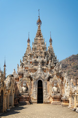 Fototapeta na wymiar Detail of a pagoda in Tharkhaung buddhist monastery in Burma, Myanmar