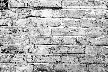 Texture of a brick wall with cracks and scratches