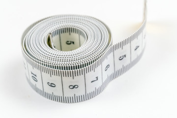 Coil white centimeter for measurement, macro photography.