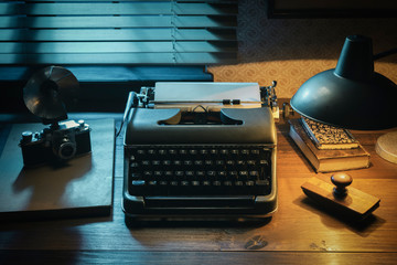Photoreporter vintage desk with typewriter