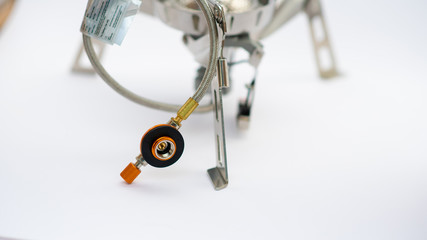 portable gas stove for cooking. Hiking, camping equipment. bushcraft and survival concept