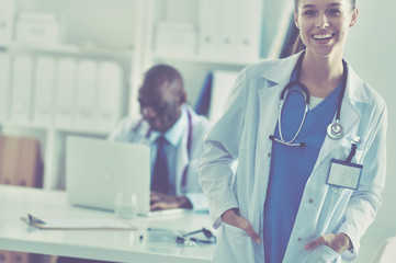 Doctors analyzing an x-ray in a meting. Doctors