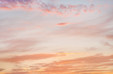 Beautiful sky with clouds before sunset. Fiery summer sunset.
