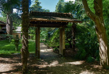 Japanese style entrance gate to beautiful Albert Kahn Park during summer - Boulogne-Billancourt near Paris - France