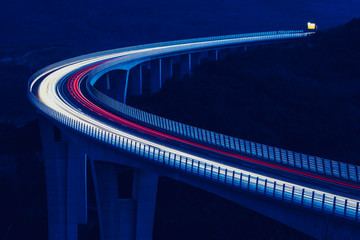 Global transport and logistics connection. Heavy traffic on the modern and futuristic highway.