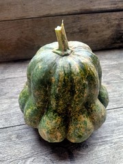 pumpkin on a wooden table