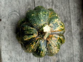 pumpkin on a wooden table