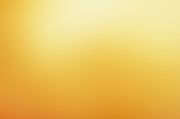 Gold background texture. Gold blurred gradient style. Golden metal foil.