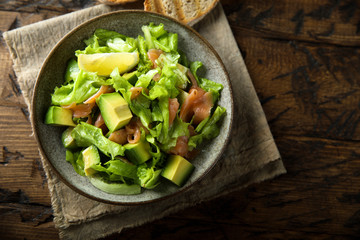 Healthy avocado salad with smoked salmon