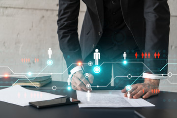 Businessman in suit signs contract. Double exposure with social network hologram. Man signing agreement on smm and analysis. International network concept.
