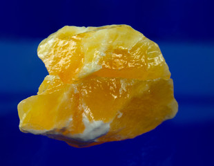 Orange calcite from Madagascar. Natural minerals. Look so real that you would most like to eat it.