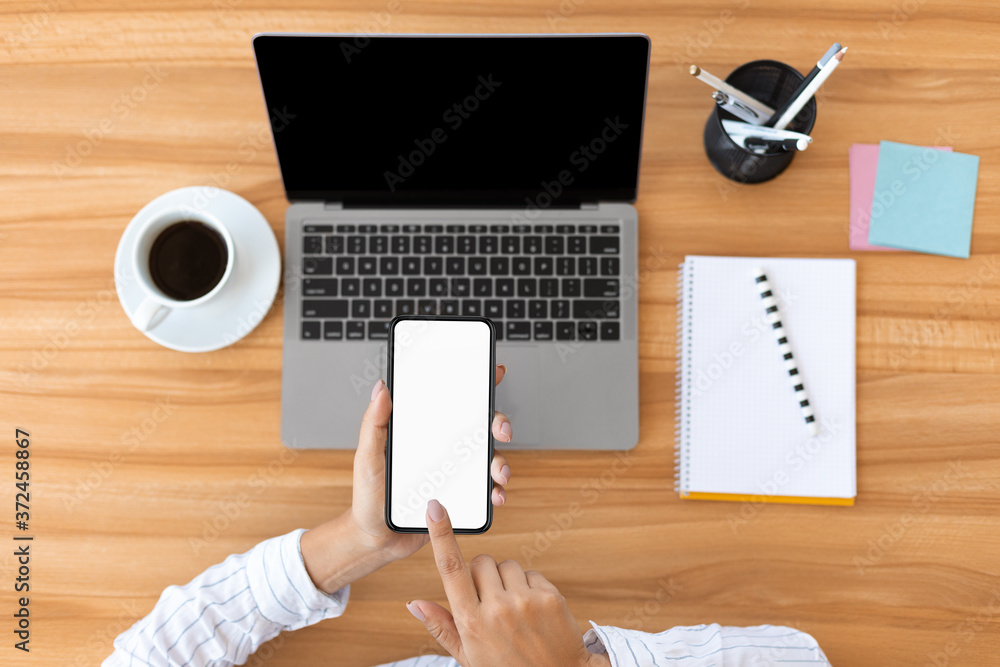 Poster top view female using smart phone with mockup