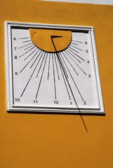 The stone-made sun-dial of the church of Agios Ioannis at Symi island in Greece.