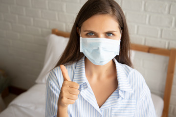 White woman recommending you to wear face mask in your home