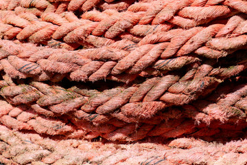 The texture of the old real ship ropes. Marine background.