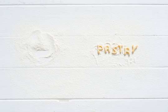 Background with 'Pastry' writen in dough