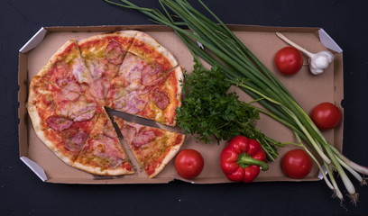 Tasty pepperoni pizza. On wooden background