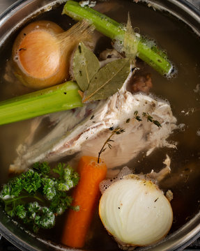 Chicken stock cooking.