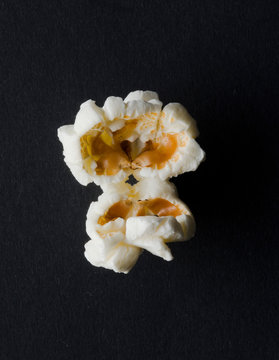 Popcorn Kernel on a black slate background