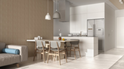 Blur background interior design, modern living room with sofa, dining table with chairs, kitchen with island, appliances and pendant lamps. Marble floor,