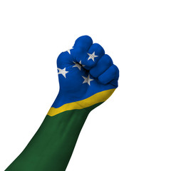 Hand making victory sign, solomon islands painted with flag as symbol of victory, resistance,...