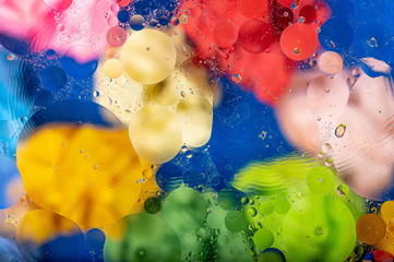 Liquid beautiful abstract colorful background, oil and water surface.