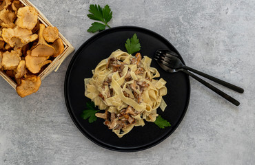 Italian pasta Tagliatelle with chanterelle mushrooms