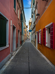 Narrow streets among the colorful buildings of a seaside village