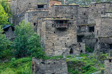 Old Fortress in mountain village Shatili, ruins of medieval castle