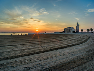 Beach landscape at sunrise with warm colors