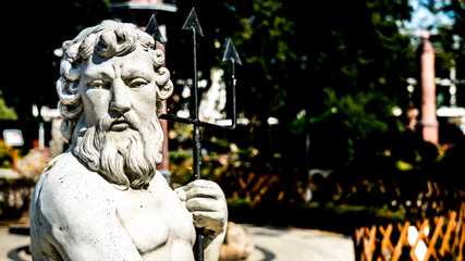 Statue of Poseidon in a seaside park