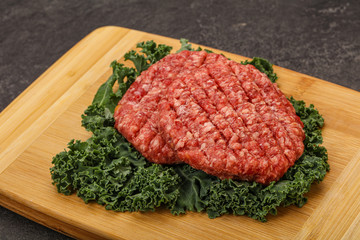 Raw beef burger cutlet for cooking