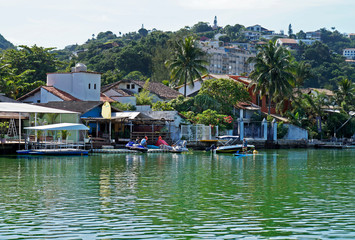 Fototapeta na wymiar Houses at the tropical landscape, Barra da Tijuca, Rio