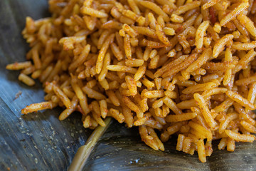 Nigerian Spicy Jollof rice served on a leaf