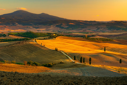 warm light of a summer sunset at the podere Terrapille very close to Pienza in Val d'Orcia, Italy