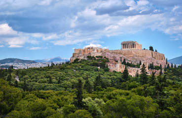 View of Acropolis hill and theater of Odeon in Athens, Greece from the hill of Philoppapos or Muses...