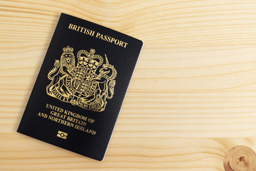 London, UNITED KINGDOM - AUGUST 17, 2020: New British Passport Edition released in March 2020 after Brexit laid on desk, citizenship newsworthy