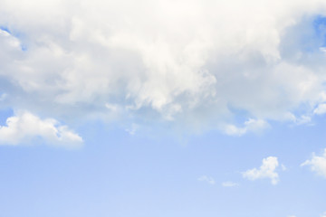 Sky with clouds for background. The sky is blue.