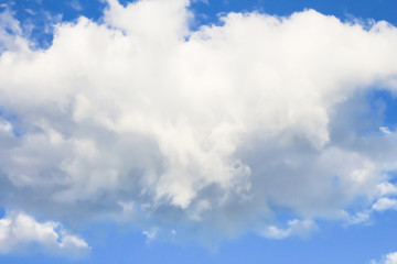 Sky with clouds for background. The sky is blue.