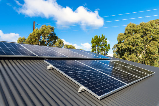 New solar panels installed on metal sheet roof of the house in South Australia