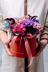 Beautiful floral arrangement in hat box