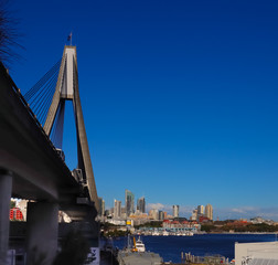 Fototapeta na wymiar Sydney Anzac Bridge on a sunny blue sky afternoon