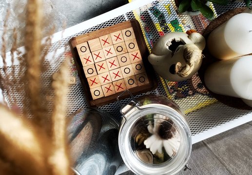 tic tac toe XO game , Wood Toys, warm light and vintage effect with interior decoration
